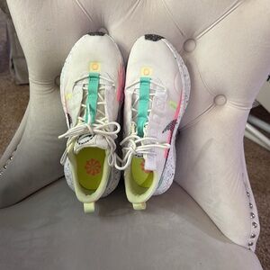 NIKE women’s Athletic Shoes, Women’s size 9.5. White with pink, green accents.